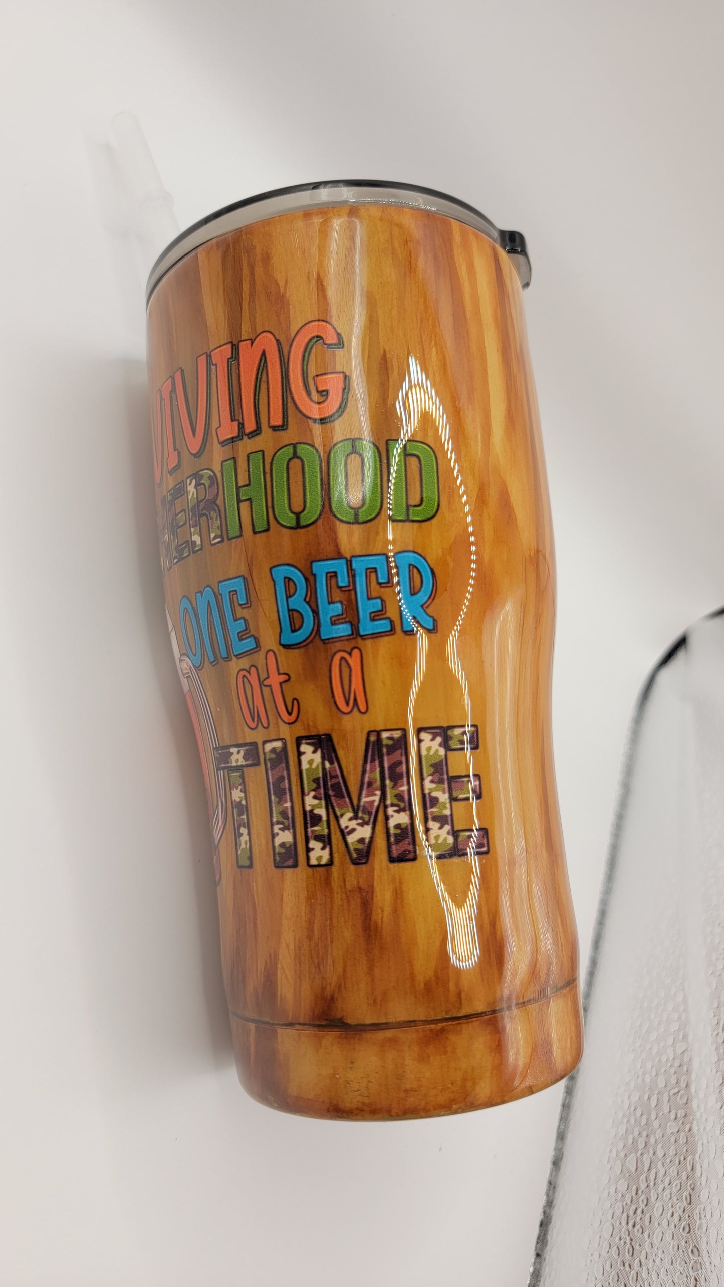 20oz Surviving fatherhood one beer at a time woodgrain tumbler